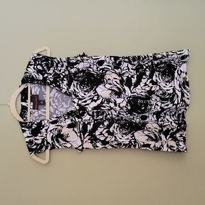 Dana Buckman sleeveless patterened shirt in tan, white, and black